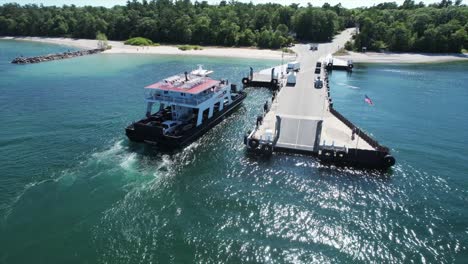 The-Washington-Island-Car-Ferry-approaches-the-pier-at-Northport,-Wisconsin-located-on-the-far-north-shore-of-the-Door-County-Peninsula-located-between-Lake-Michigan-and-the-bay-of-Green-Bay