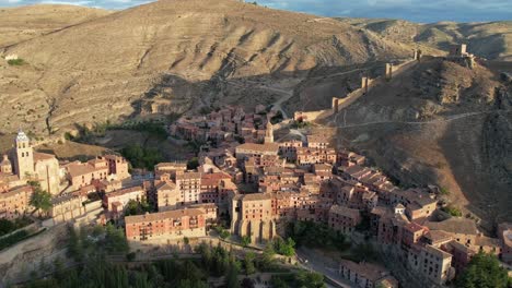 Forward-flight-view-of-Albarracin-village-in-Teruel,-Spain,-one-of-the-most-beautiful-villages,-recorded-just-afte-dawn