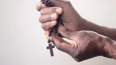 praying-to-god-with-cross-in-hands-together-with-cross-stock-footage
