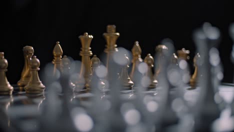 Chess-game-set-up-on-board---tactical-battle-to-commence,-arcing-shot