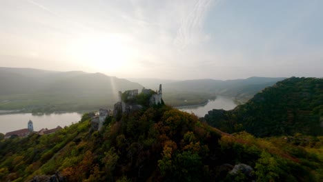 FPV-gliding-around-the-ruin-of-Dürnstein-before-dynamically-descending-into-the-city