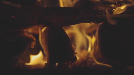 Macro-shot-of-logs-burning-in-a-fire-pit