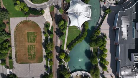 Aerial-view-above-the-World's-Fair-park,-sunny,-summer-day-in-downtown-Knoxville,-USA---top-down,-drone-shot