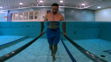 Physical-therapy-walking-in-water-pool-workout