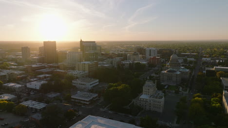 Scenic-aerial-over-downtown-Boise-Idaho-cityscape-at-sunset