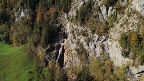 Tall-cliffs-and-waterfall-in-Klontal,-Switzerland.