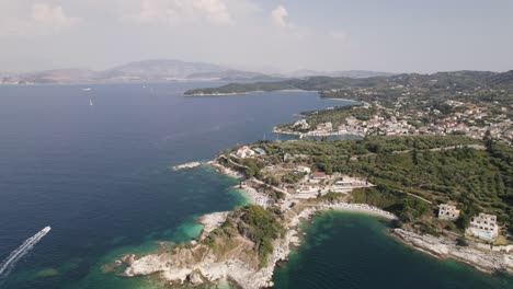 Kassiopi-fishing-village-coastline,-Corfu,-Greece