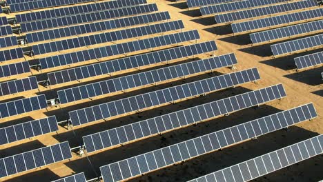 Aerial-View-of-Solar-Plant,-Massive-Array-of-Solar-Panels-in-Mojave-Desert,-California-USA