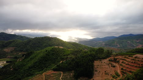 Serene-landscape-of-tropical-forest-on-hills-in-Binh-Phuoc,-Vietnam,-aerial-view