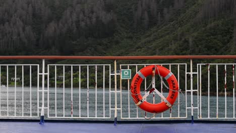 Lifebuoy-on-the-deck-of-a-ferry-in-Wellington,-New-Zealand