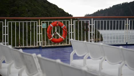Static-view-from-top-deck-of-ferry-riding-along-the-lush-mountains-of-the-northern-fiords-on-New-Zealand's-south-Island