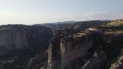 Aerial-view-of-Meteora-landscape,-stunning-rock-formation-in-Greece,-UNESCO-World-Heritage