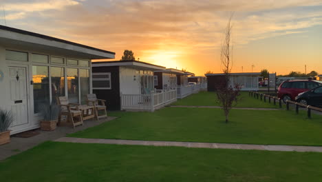 Chalets-at-sunset-on-a-holiday-park-campsite-on-the-coast-in-England