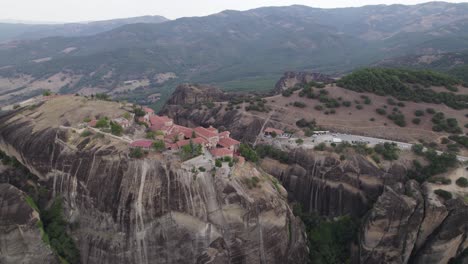 Aerial-riser-view-of-Great-Meteoron-Monastery-atop-impressive-rock-formation