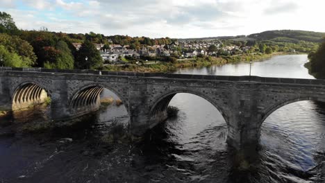 Flying-away-drone-shot-of-The-King-George-VI-Bridge-is-a-bridge-over-the-River-Dee-in-Aberdeen,-Scotland