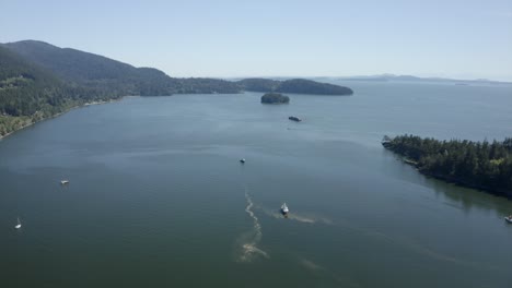Drone-flying-over-sail-boats-in-the-puget-sound---boating,-drone,-PNW