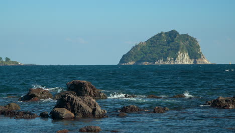 Picturesque-Scenery-Of-Seopseom-Island-Across-The-Sea-With-Basalt-Rock-Outcrops-In-Jeju-do,-South-Korea