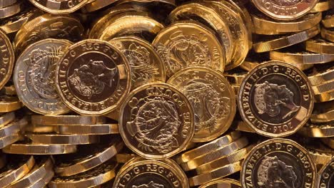 Pile-of-Pounds-in-Rotation.-British-Coin