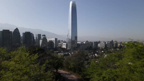 Comingo-into-shot-of-Costanera-Tower-in-Santiago-de-Chile,-uhd-4k-aerial