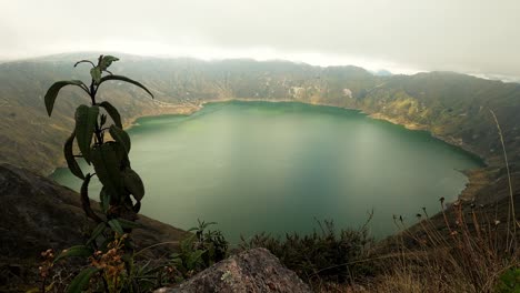 Timelapse-of-low-clouds-moving-across-Quilotoa-lake-in-Ecuador,-Andes-Mountains