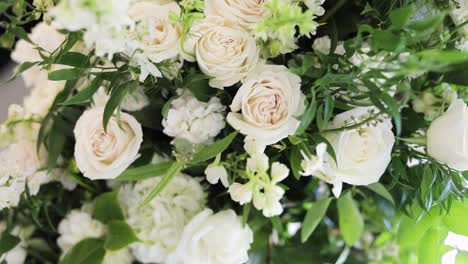 Beautiful,-Romantic-White-Roses-and-Flower-Bouquet-with-Green-Leaves