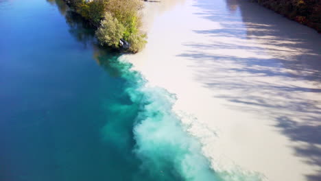Merging-river-of-blue-and-brown-water-in-Geneva-Switzerland-4k