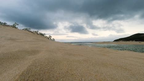 Timelapse-of-Clouds-rolling-over-a-Sandy-Beach