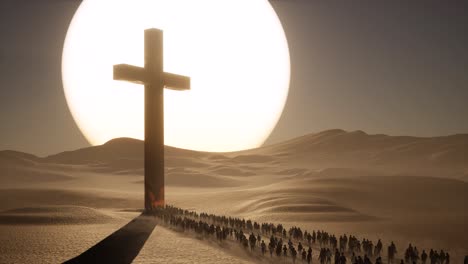 A-huge-gold-cross-on-the-desert-with-people-walking-towards-it,-and-a-big-sunset-3D-animation