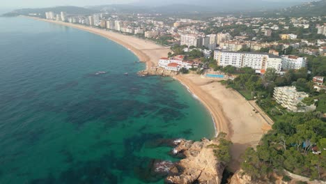 Impressive-aerial-view-of-a-paradisiacal-beach-on-the-Costa-Brava-in-Girona-Playa-de-Aro