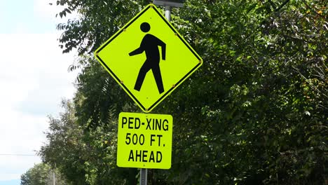 Ped-crossing-sign-with-flashing-warning-lights