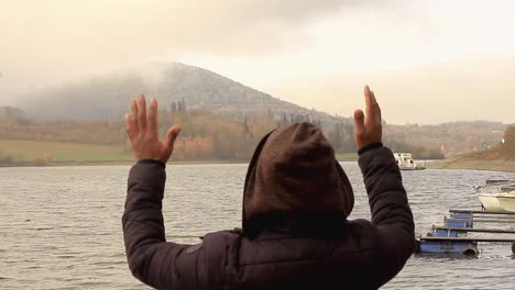 black-man-praying-to-god-with-arms-outstretched-looking-up-to-the-sky-stock-video-stock-footage