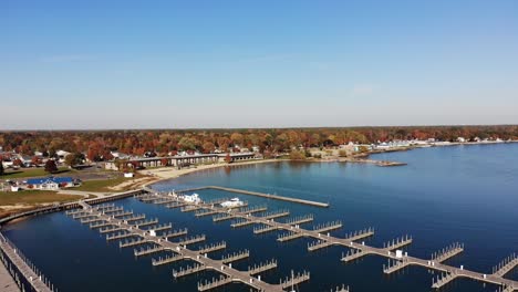 A-high-angle-flyover-of-Harbor-Park-Marina-on-Lake-Huron-in-the-autumn-season