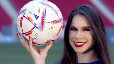 Cute-brunette-Brazil-fan-plays-with-football,-slow-motion