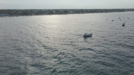 Aerial-Drone-Shot-of-Small-Anchored-Fishing-Boat