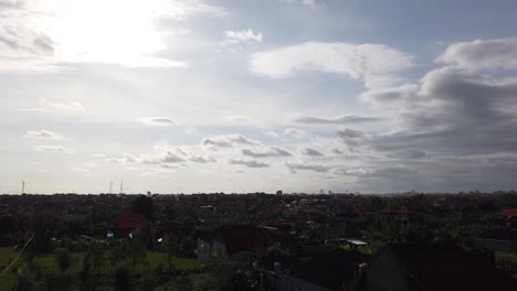 Panoramic-Above-Village-in-Gianyar,-Bali,-Indonesia,-South-East-Asia-Rice-Fields-Clear-Sunset-Sky