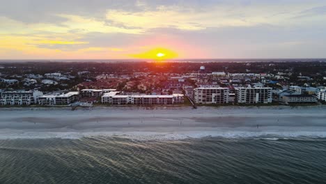 Jacksonville-Beach-FL-at-Sunset-Over-Water---Aerial-Tracking-Left