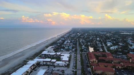 Jacksonville-Beach-FL-at-Sunset-Flying-Over-Water---Aerial-Wide