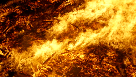 A-super-close-up-shot-of-a-huge-bonfire-burning