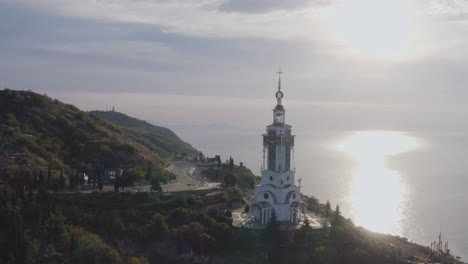 Aerial-view-church-tower-on-coastline-landscape-001
