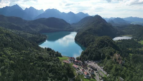 Alpsee-Lake-in-Germany-near-Fussen-high-angle-establishing-drone-aerial-view