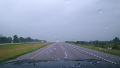 driving-down-hwy-on-rainy-day