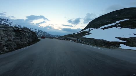 A-scenic-drive-through-the-Norwegian-countryside-following-another-vehicle