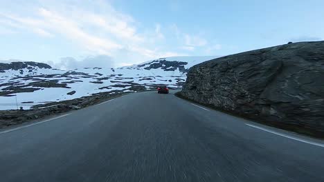 A-scenic-drive-through-the-Norwegian-countryside-following-another-vehicle