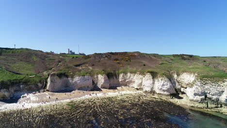 Aerial-approach-to-Flamborough-beach-on-a-sunny-day