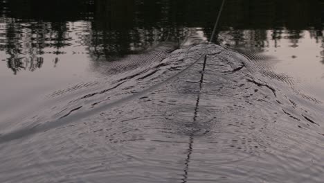 Water-moody-evening-rope-in-a-water-pulling