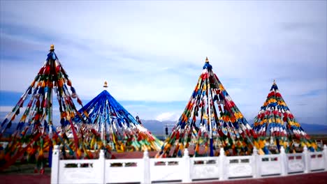 time-lapse-shot-of-tibetan-flags,-pagodas,-temples---religious-structures