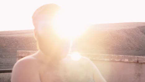 Bearded-Man-relaxes-in-the-British-Sunshine-SLOWMO