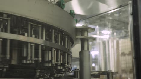 Large-spinning-machinery-at-packaging-factory,-MEDIUM