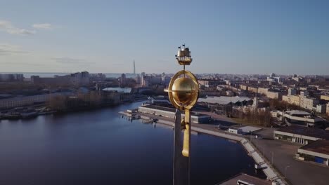 Symbol-of-sailing-boat-on-top-of-a-port-aerial-view-on-a-city-panorama,-Saint-Petersburg-Russia