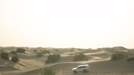 Driving-In-Sand-Dunes-Slow-Motion